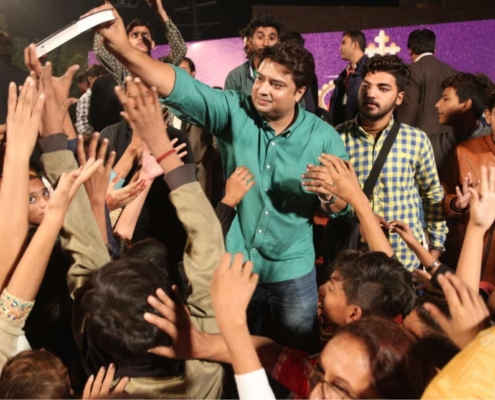 Free Urdu Bibles distribution during a Gospel crusade in Pakistan by Good Samaritan Ministries
